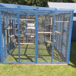 Waterproof Four-Sided Catio cat enclosure painted blue.  Waterproof Four-Sided Catio cat enclosure painted blue.